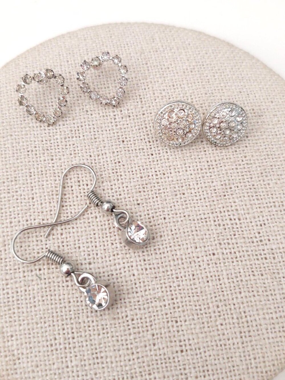 3 pairs of silver tone earrings with clear cz accents